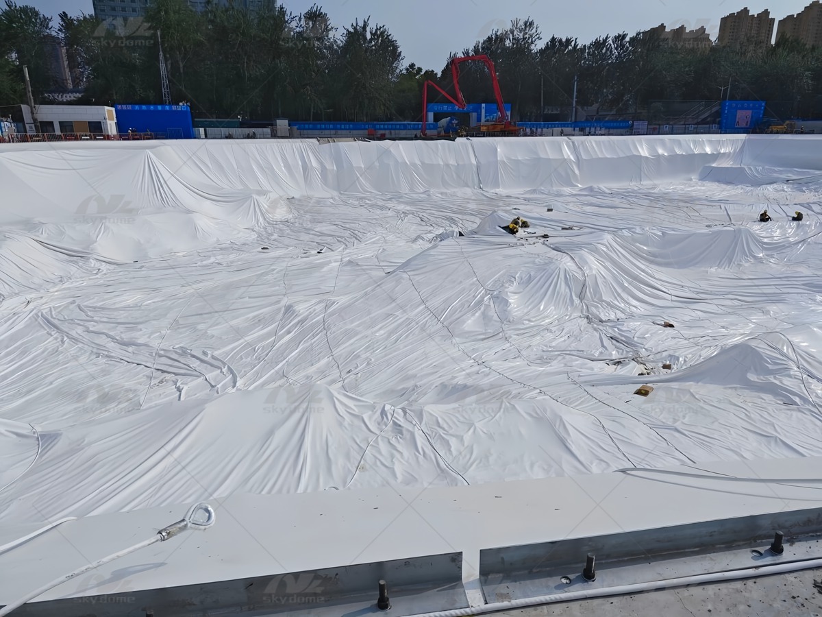 Deploying Weather-Resistant Large-Span Air Dome for Isolated and Quiet Construction